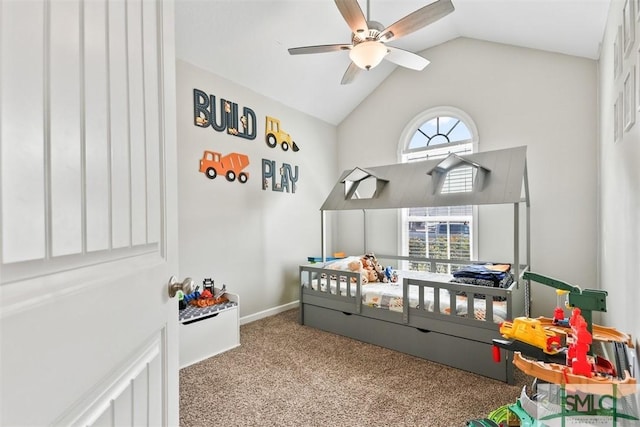 bedroom featuring ceiling fan, baseboards, lofted ceiling, and carpet floors