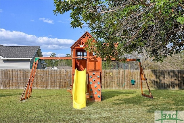 view of play area featuring a yard and a fenced backyard