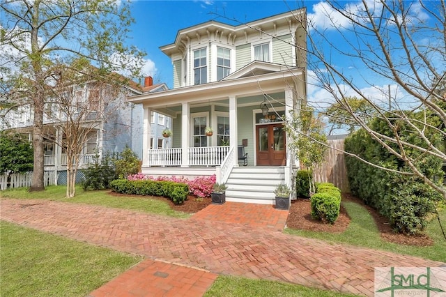 italianate house with a porch and french doors