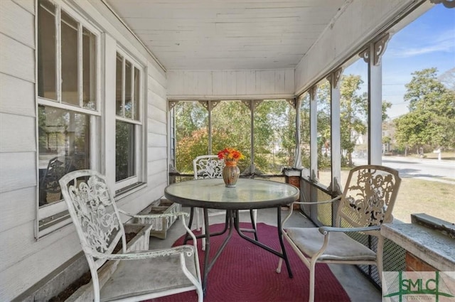 sunroom / solarium with wood ceiling