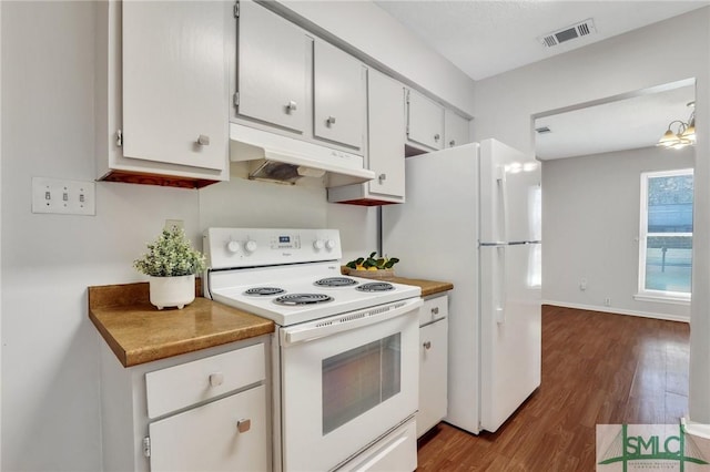 kitchen featuring visible vents, under cabinet range hood, dark wood-style floors, white appliances, and white cabinets