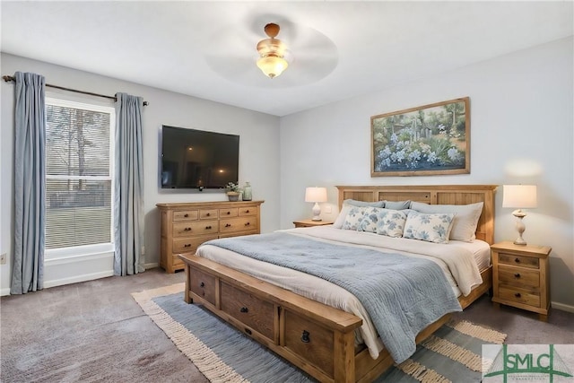 bedroom with baseboards, ceiling fan, and carpet flooring