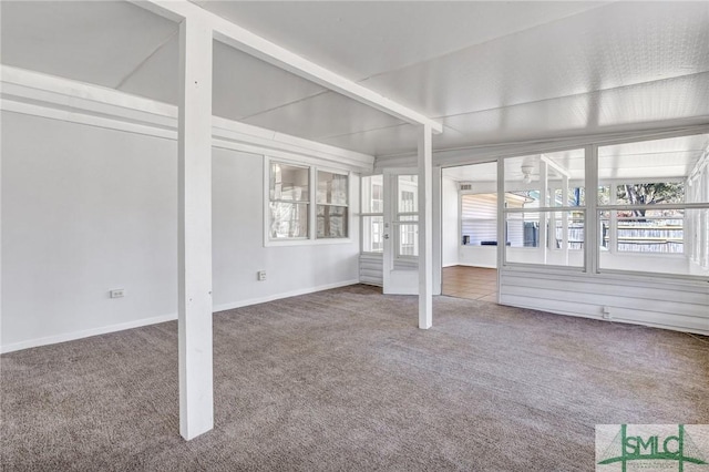 unfurnished sunroom featuring french doors