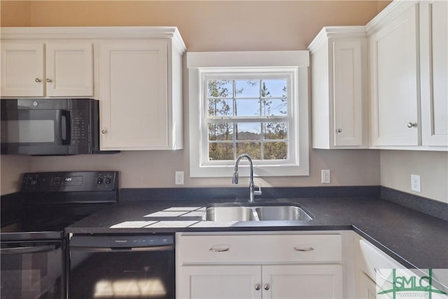 kitchen featuring a sink, dark countertops, black appliances, and white cabinets