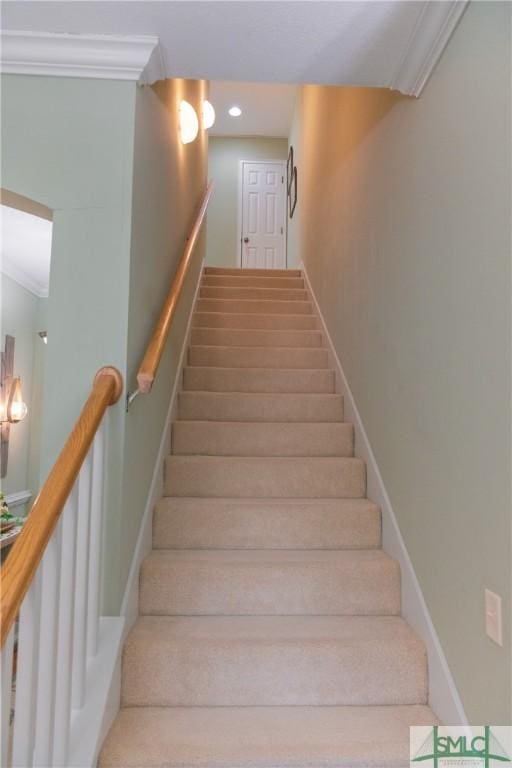 stairs featuring recessed lighting, baseboards, and ornamental molding