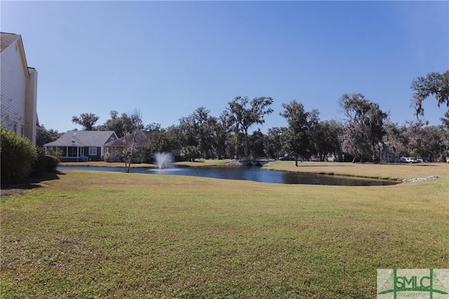 view of yard with a water view