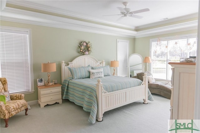 bedroom with visible vents, ceiling fan, carpet, and ornamental molding