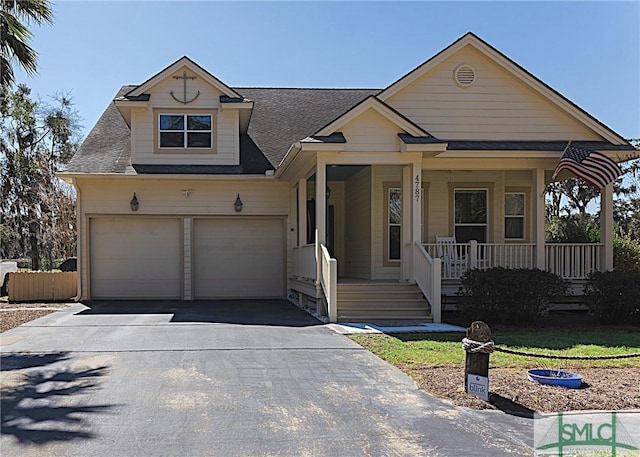 view of front of home with a shingled roof, a porch, a garage, and aphalt driveway