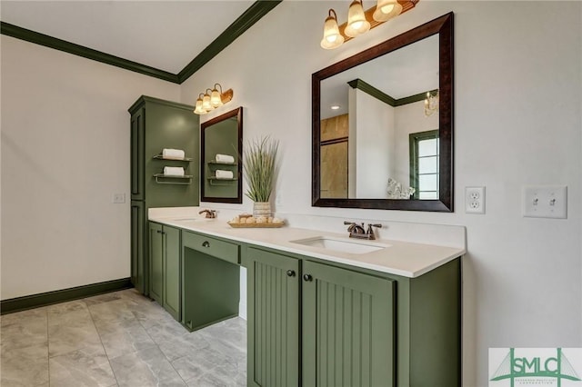 bathroom with double vanity, ornamental molding, baseboards, and a sink