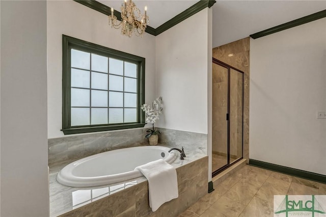 full bathroom featuring a chandelier, a garden tub, a stall shower, and crown molding