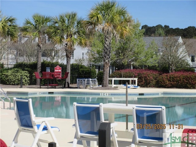 pool featuring fence