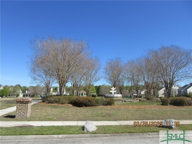 exterior space featuring a yard