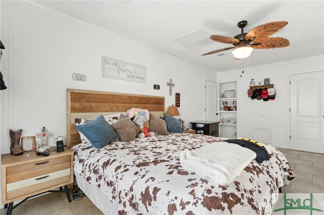 tiled bedroom with ceiling fan and crown molding