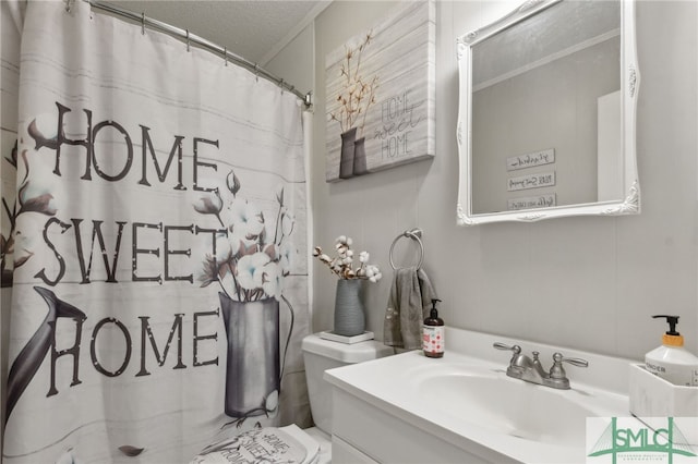 full bath with a textured ceiling, a shower with curtain, vanity, and toilet