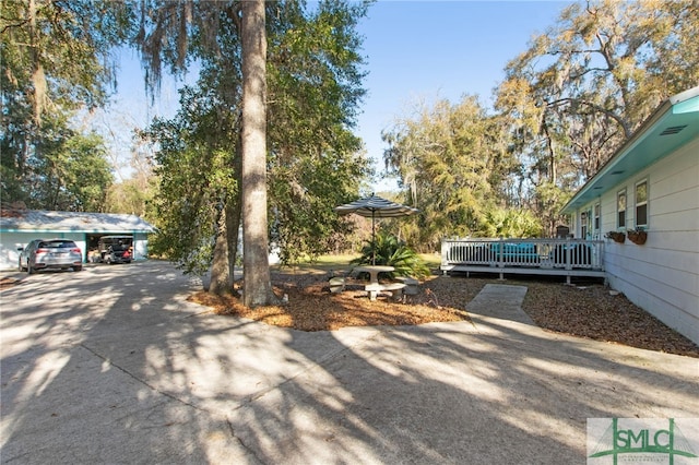 exterior space featuring a wooden deck