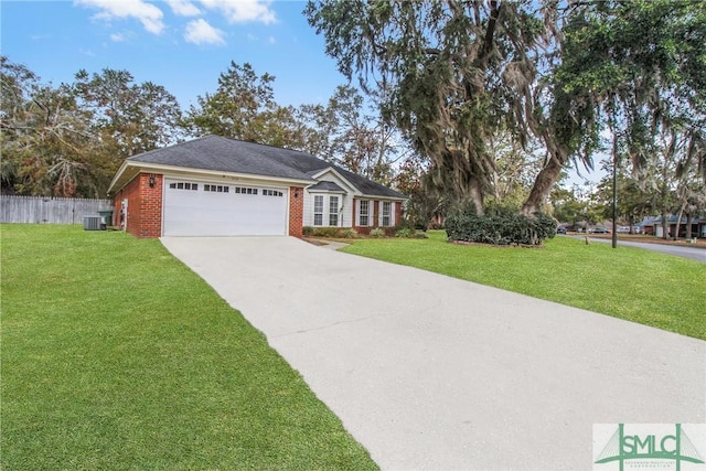 ranch-style house with brick siding, an attached garage, driveway, and a front yard