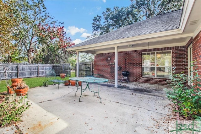 view of patio featuring grilling area and a fenced backyard