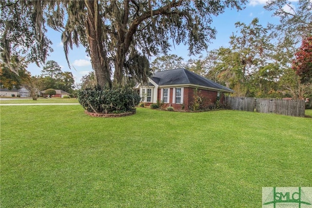 view of yard featuring fence