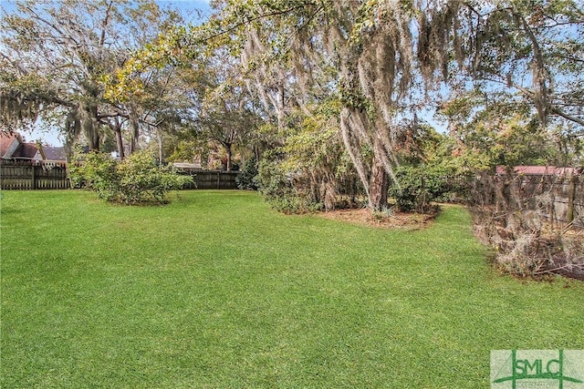 view of yard featuring fence