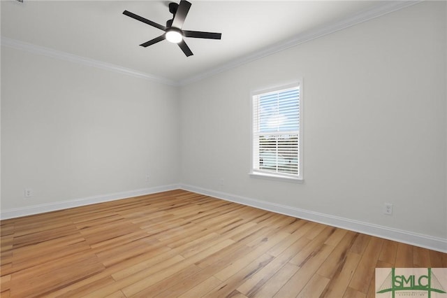 empty room with crown molding, baseboards, light wood finished floors, and ceiling fan