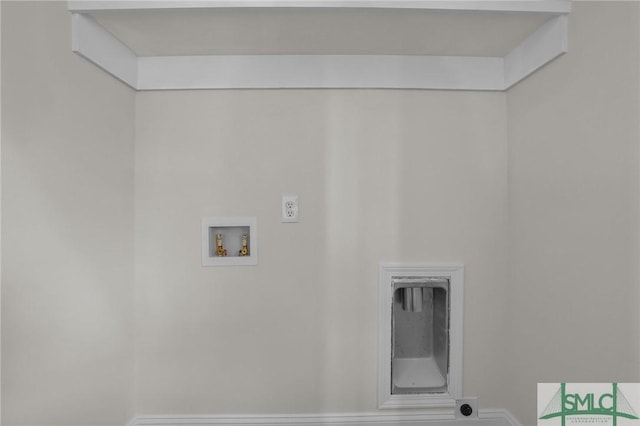 clothes washing area featuring laundry area, hookup for an electric dryer, baseboards, and washer hookup