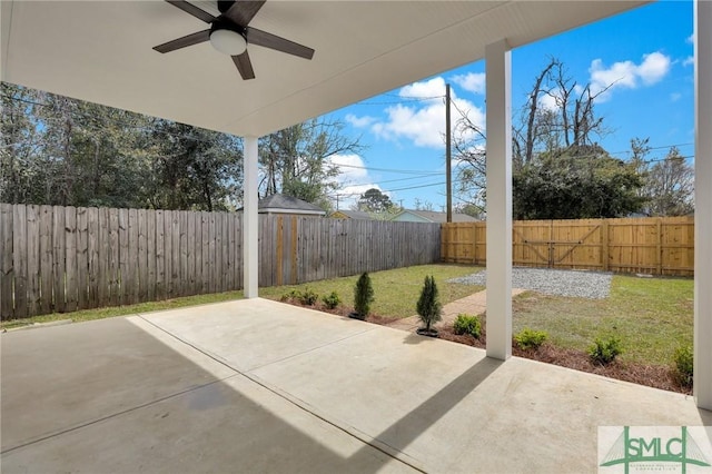 view of patio featuring a fenced backyard and ceiling fan