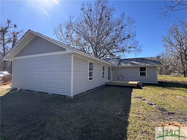 exterior space with a yard and a deck