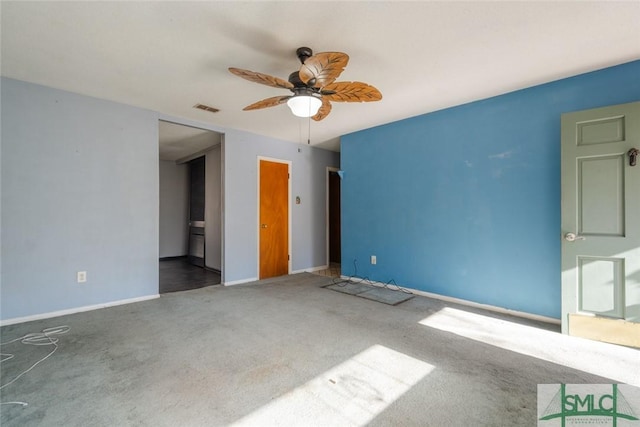 unfurnished bedroom with visible vents, baseboards, ceiling fan, and carpet flooring