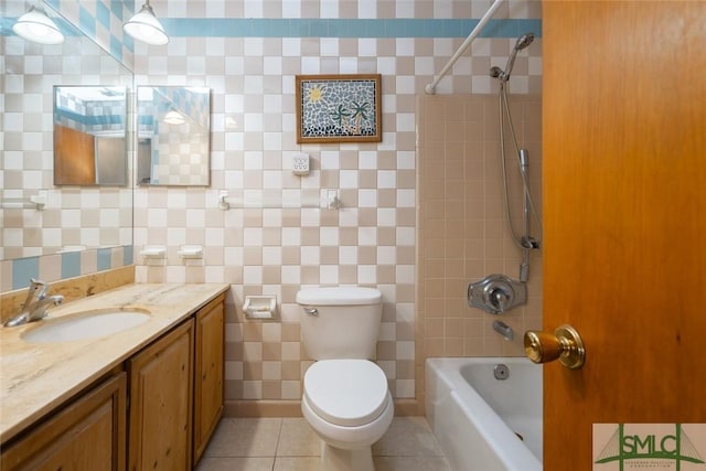 full bathroom with toilet, shower / tub combination, vanity, and tile patterned flooring