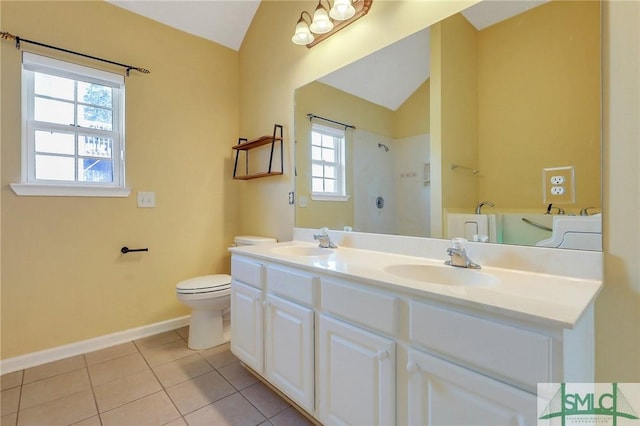 full bathroom featuring tile patterned floors, vaulted ceiling, a shower, and a sink