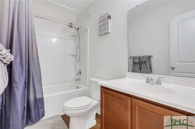 full bathroom featuring toilet, vanity, and shower / bath combination with curtain