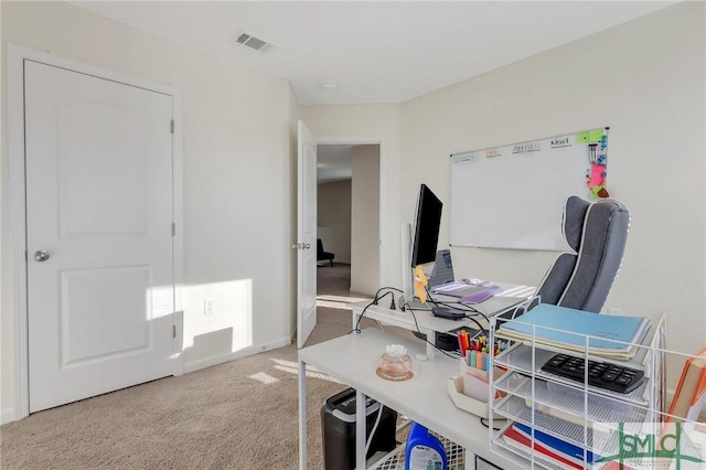 home office featuring visible vents and carpet floors