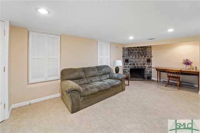 living area with visible vents, baseboards, carpet flooring, recessed lighting, and a fireplace