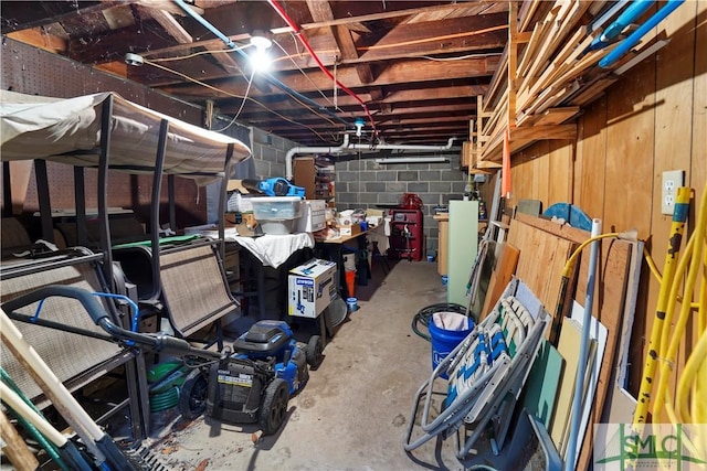 interior space featuring concrete block wall