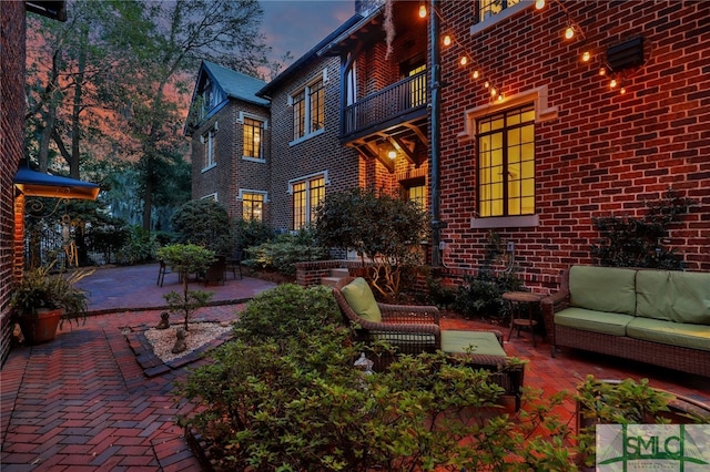 view of patio / terrace with outdoor lounge area and a balcony