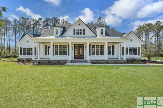 126 Carapace Ct, Richmond Hill, GA 31324 - modern inspired farmhouse with french doors, metal roof, and a standing seam roof