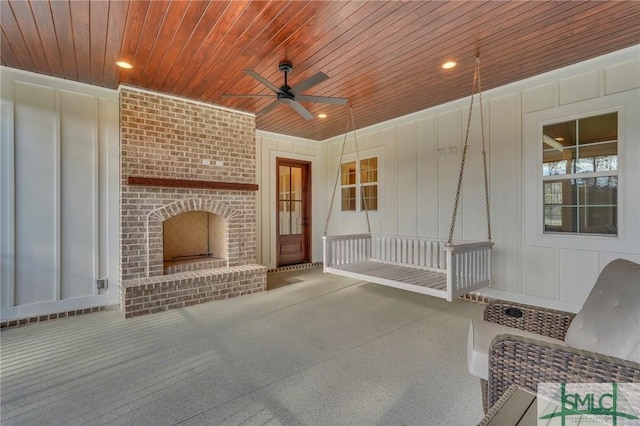 126 Carapace Ct, Richmond Hill, GA 31324 - view of patio / terrace featuring a fireplace and ceiling fan