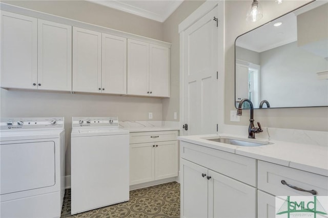 126 Carapace Ct, Richmond Hill, GA 31324 - laundry area featuring light tile patterned floors, cabinet space, a sink, crown molding, and independent washer and dryer