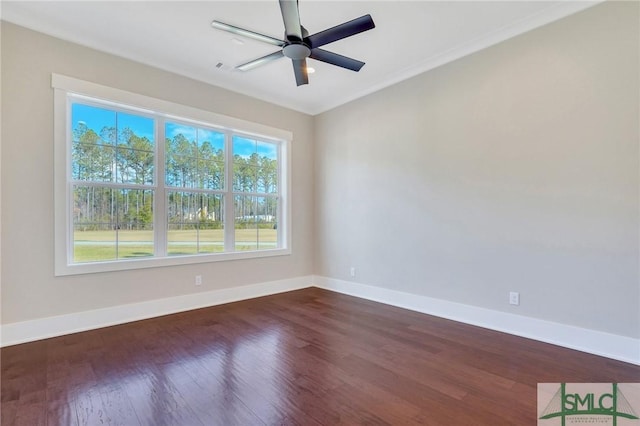 126 Carapace Ct, Richmond Hill, GA 31324 - spare room featuring ceiling fan, dark wood-type flooring, baseboards, and ornamental molding