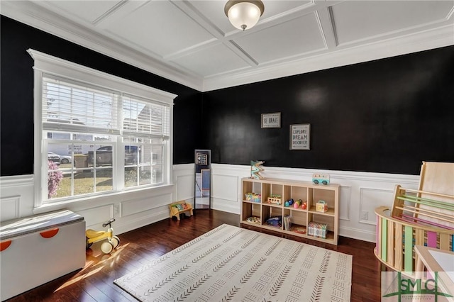 game room with wood-type flooring, coffered ceiling, and wainscoting