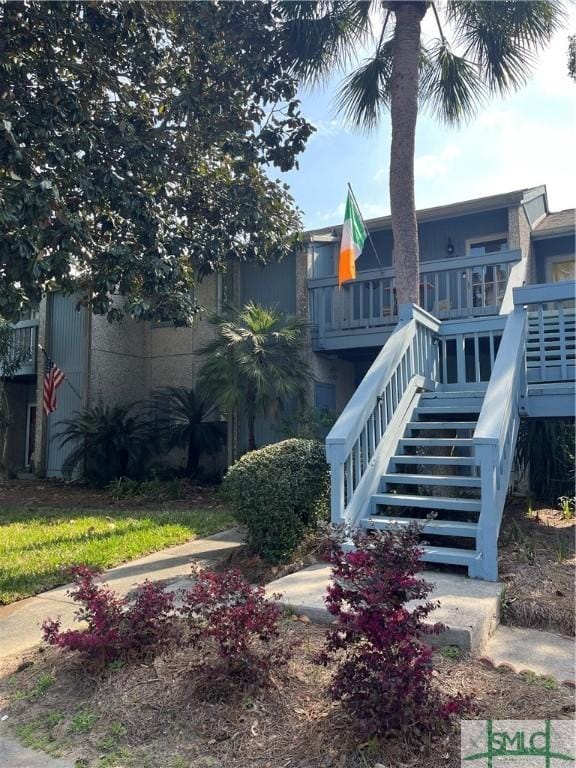 view of yard featuring stairs