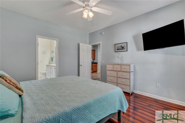 bedroom with ceiling fan, baseboards, wood finished floors, and ensuite bathroom