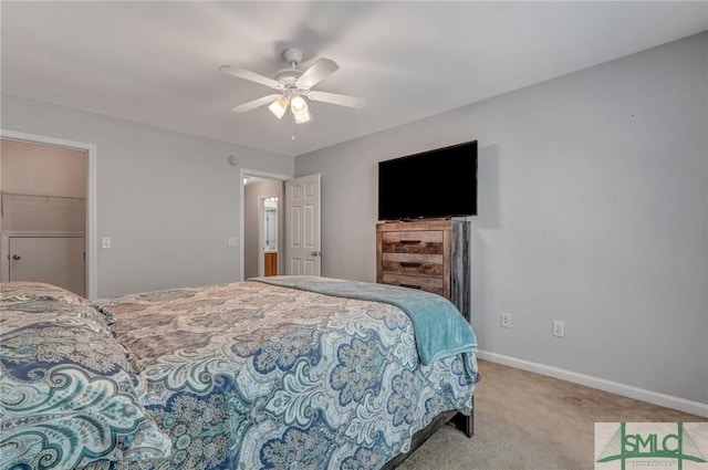 carpeted bedroom featuring a ceiling fan and baseboards