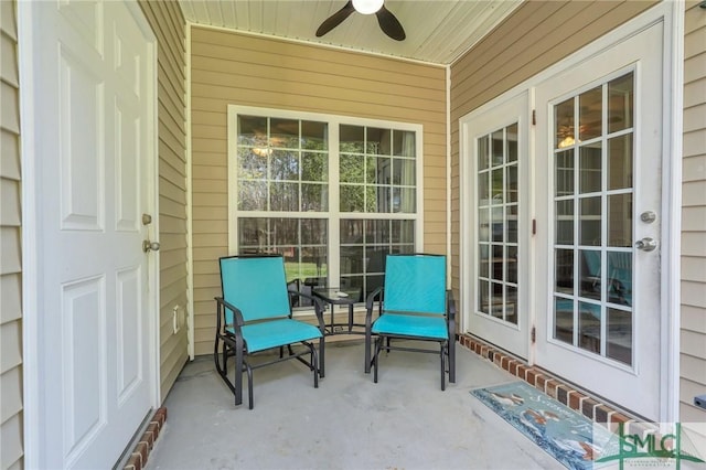 view of patio featuring a ceiling fan