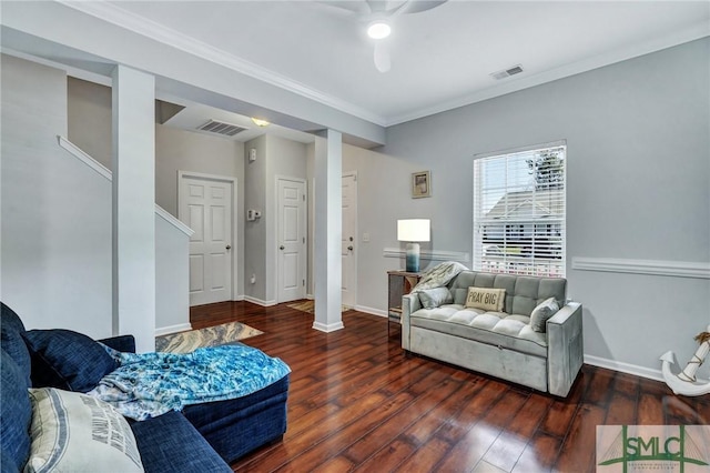 living room with visible vents, a ceiling fan, baseboards, and hardwood / wood-style floors