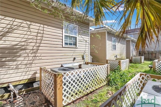 wooden terrace featuring fence