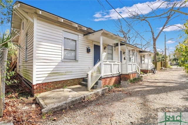 view of front of home featuring covered porch