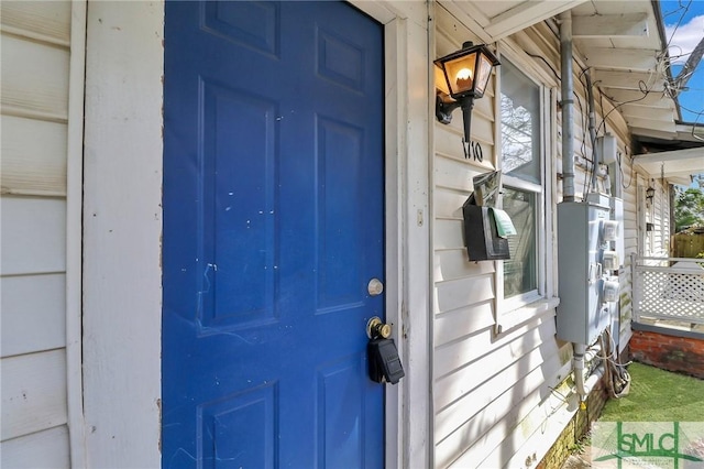 entrance to property with a porch