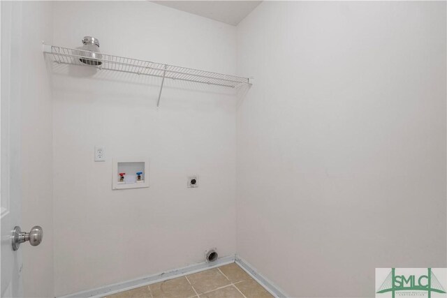 laundry room featuring washer hookup, light tile patterned flooring, baseboards, hookup for an electric dryer, and laundry area