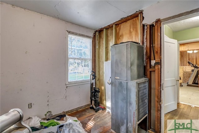 miscellaneous room with wood-type flooring